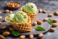 Pistachio Ice Cream Scoops with Waffles Nuts and Fresh Mint Royalty Free Stock Photo