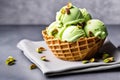 Pistachio Ice Cream Scoops with Waffles Nuts and Fresh Mint Royalty Free Stock Photo