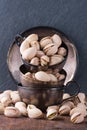Pistachio nuts in metal cups