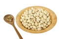 Pistachio nuts in a wooden bowl on white Royalty Free Stock Photo