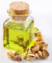 Pistachio oil with nuts Royalty Free Stock Photo