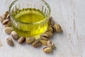 Pistachio oil with nuts. Royalty Free Stock Photo