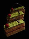 Pistachio puff pastry cake with raspberries and chocolate