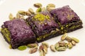 Pistachio purple baklava on a white background. Baklava specially prepared for diabetics. Traditional Mediterranean cuisine delica