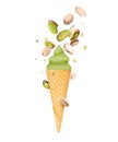 Pistachio soft serve ice cream with pistachios in wafer cone close-up, isolated on white background Royalty Free Stock Photo