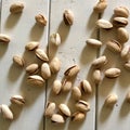 Pistachio on white wooden rustic backdrop. Concept of nuts