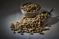 Pistachios in bowl and scoop table-top setting