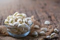 Pistachios in.Glass cup on old wood background Royalty Free Stock Photo