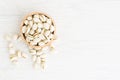 Pistachios nut on white wood background and copy space, top view and flat lay Royalty Free Stock Photo