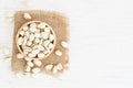 Pistachios nut on white wood background and copy space, Top view and flat lay Royalty Free Stock Photo