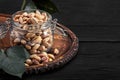 Pistachios nuts on dark background, top view, healthy snack Royalty Free Stock Photo