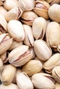 Pistachios nuts on dark background, top view, healthy snack Royalty Free Stock Photo