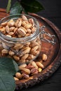 Pistachios nuts on dark background, top view, healthy snack Royalty Free Stock Photo