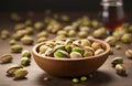 Pistachios in a plate. Peeled pistachios on a brown background. Pistachio nuts in a wooden plate. Bowl pistachios snack. Royalty Free Stock Photo