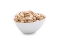 Pistachios in a white ceramics bowl