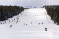 Piste with unrecognizable people skiing, snow, sunny winter day, Horni Mala Upa, Krkonose, Czech Republic Royalty Free Stock Photo