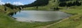 The Seebenalpsee, a secluded alpine lake on Flumserberg, Swiss Alps
