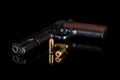 Pistol 1911 with ammunition on black Royalty Free Stock Photo