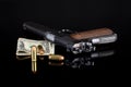 Pistol 1911 with ammunition on black Royalty Free Stock Photo