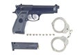 Pistol bullet magazine and handcuff . Royalty Free Stock Photo