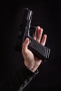 Pistol in hand Royalty Free Stock Photo