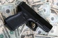 Pistol on money Royalty Free Stock Photo