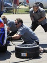 Pit crew tire change Royalty Free Stock Photo