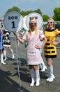 Pit girls line up at the start straight at the Benjafields Sprint. Royalty Free Stock Photo