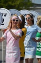 Pit girls line up at the start straight at the Benjafields Sprint. Royalty Free Stock Photo