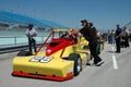 On pit lane with race cars and crews Royalty Free Stock Photo
