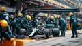 Pit Stop Anticipation: Crew Awaits the F1 Racing Car