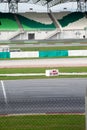 Pit stop, spectator grandstand and meshed fence Royalty Free Stock Photo