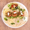 Pita bread with falafel and hummus Royalty Free Stock Photo