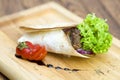 Pita bread with ham and fresh vegetables Royalty Free Stock Photo