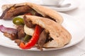 Pita bread sandwich with meat and vegetables Royalty Free Stock Photo