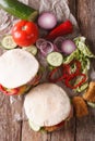 Pita with chicken and vegetables close-up on the table. vertical Royalty Free Stock Photo