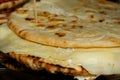 Pita with ham, cheese and salami display at the market. Italian street food Royalty Free Stock Photo