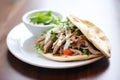 pita sandwich stuffed with gyro meat and tzatziki sauce Royalty Free Stock Photo