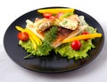 Pita wrapped in a triangle of pita bread on a plate on a white background, with cottage cheese, greens, tomatoes, breakfast and Royalty Free Stock Photo