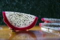 a splash of water drips into the pitaya Royalty Free Stock Photo