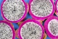 Pitayas/Dragonfruits halves over blue background Royalty Free Stock Photo