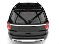 Pitch black modern SUV - back view closeup shot Royalty Free Stock Photo