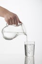 Pitcher and glass cup with water Royalty Free Stock Photo