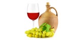 Pitcher with grape wine, glass and bunch grapes isolated on whit Royalty Free Stock Photo