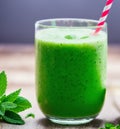 Pitcher of honeydew mint smoothie adorned with mint sprigs and honeydew slices, served with a bowl of ice cubes. AI Royalty Free Stock Photo