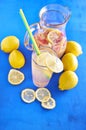 Pitcher of lemonade with lemons, and fresh Royalty Free Stock Photo