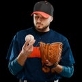Pitcher looking at a ball Royalty Free Stock Photo