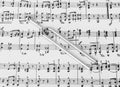 Pitchfork on sheet music - art background Royalty Free Stock Photo