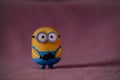 The Minions are small, yellow capsule-shaped creatures with round gray glasses.