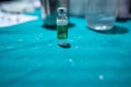 Pithoragarh, India, May, 2021 : Vial of corona vaccine COVISHIELD discarded in a box